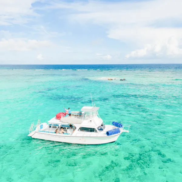 a small boat in a body of water
