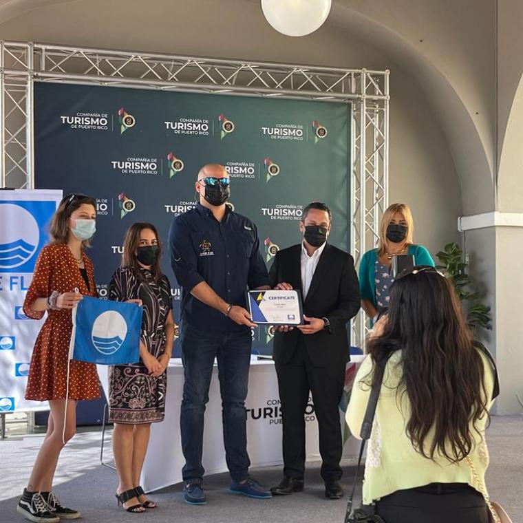 a group of people standing in a room